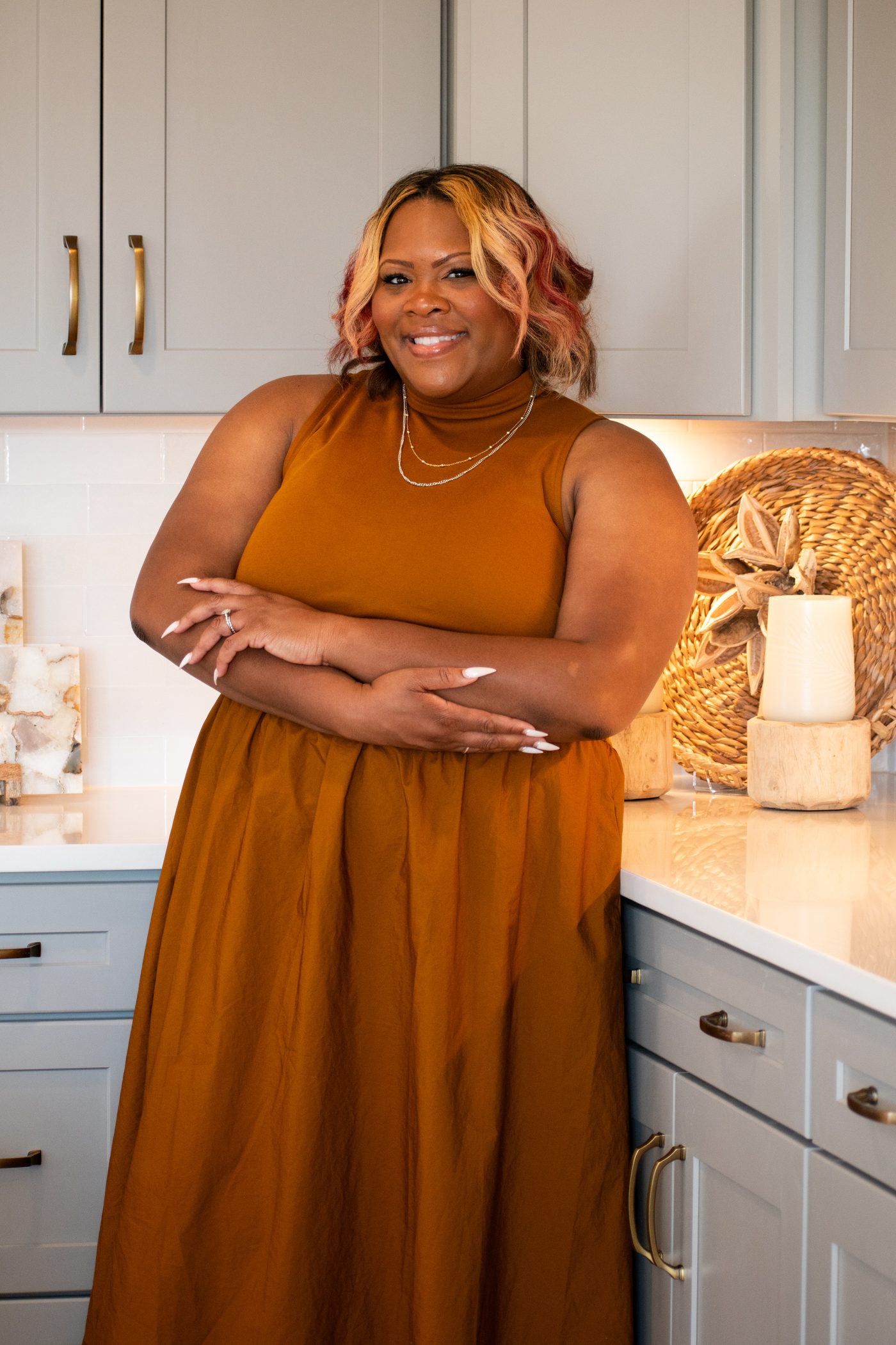 Quantella Simmons-Kinard at her desk