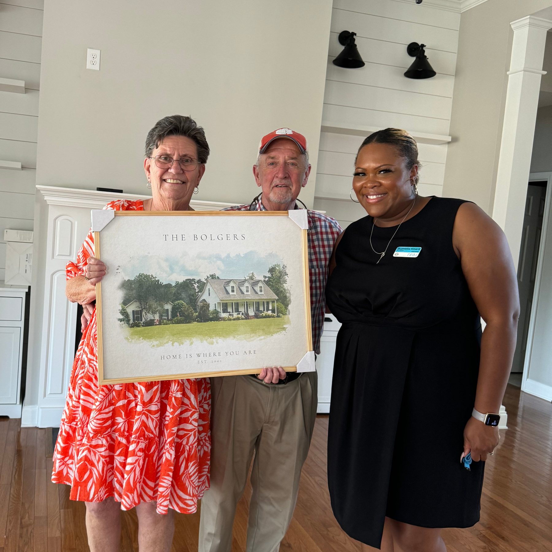 Quantella Simmons-Kinard celebrating a home closing with clients